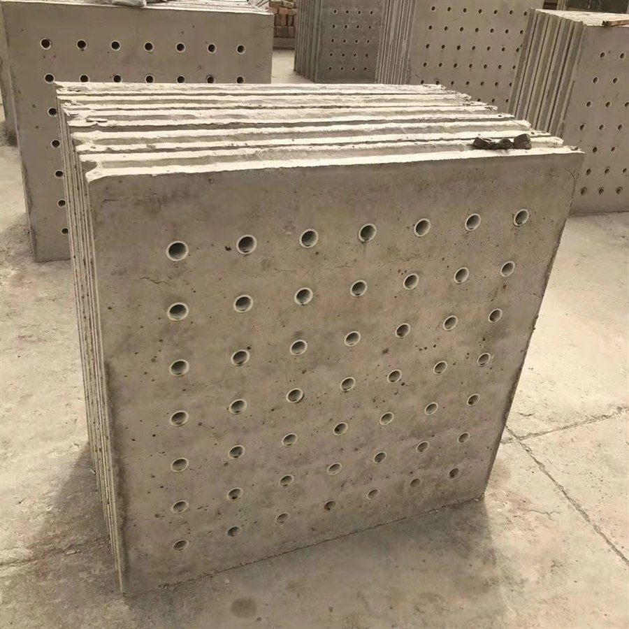 Precast concrete filter plate with a regular grid of nozzle holes