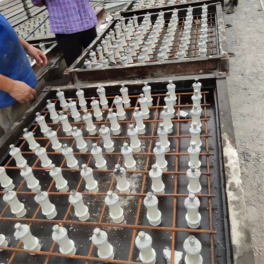 Filter nozzles set in a plate before the concrete is poured