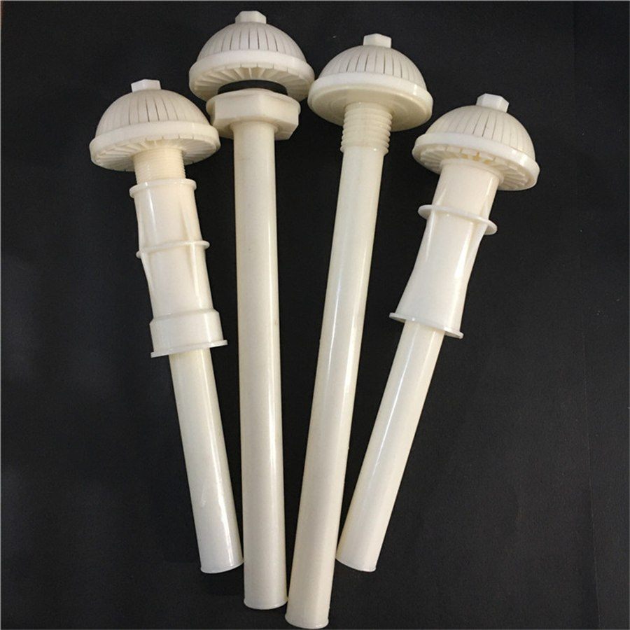 Four long-handle ABS filter nozzles on a black background