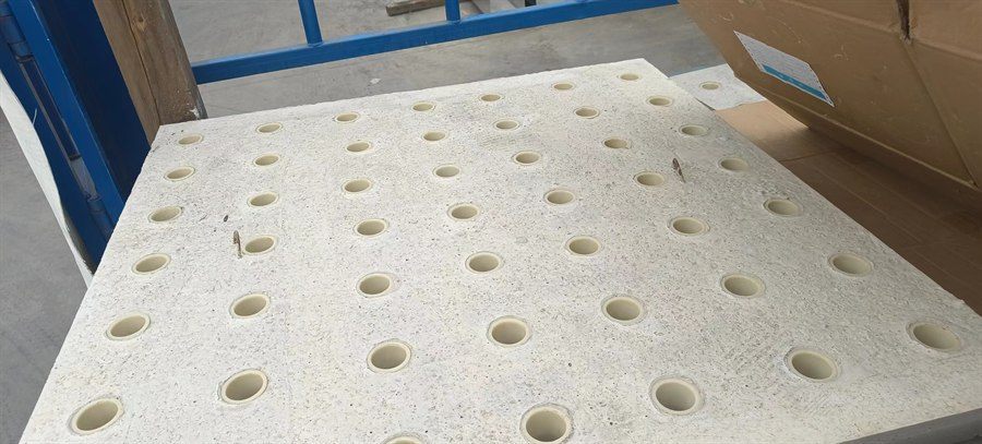Filter plate detail showing the nozzle socket arrangement
