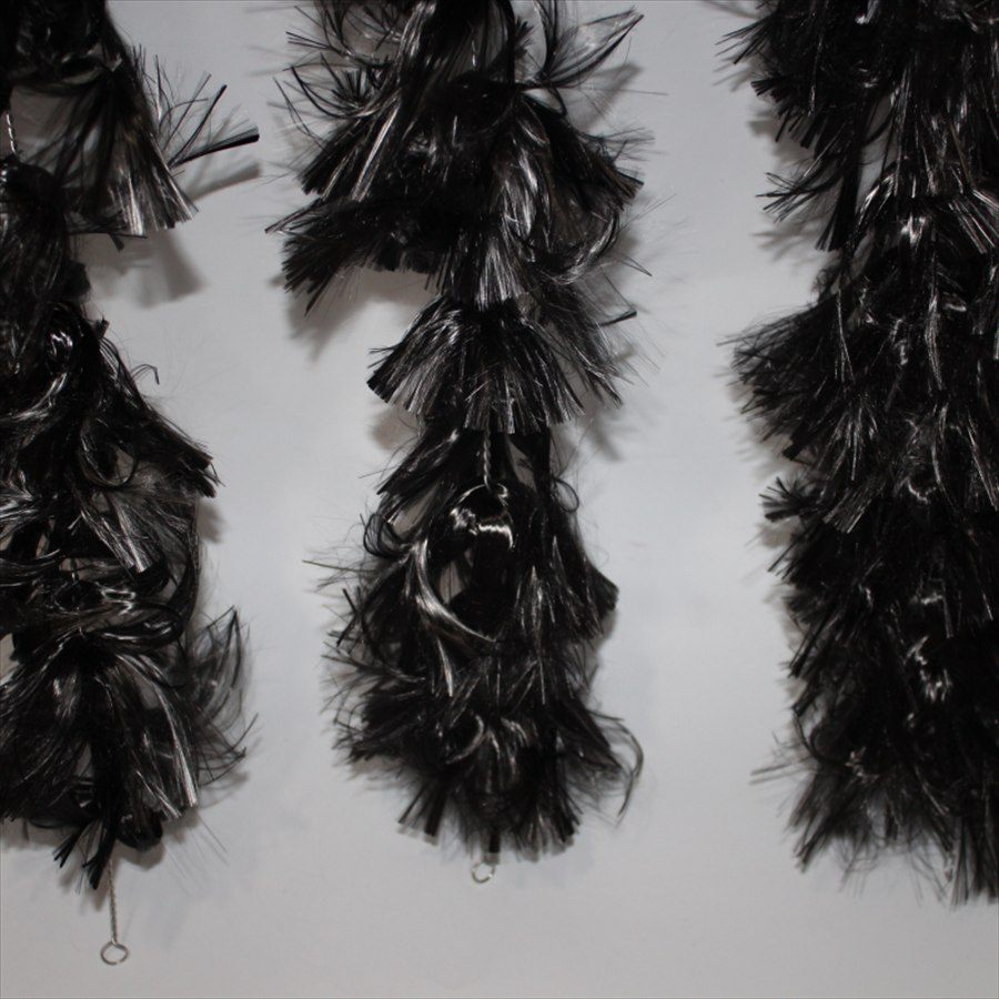 Carbon fiber water grass strands hung side by side