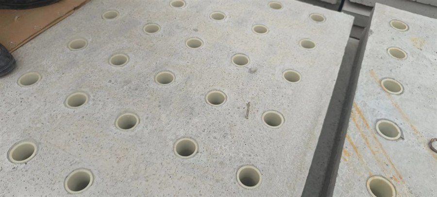Close-up of a concrete filter plate with filter nozzle sockets