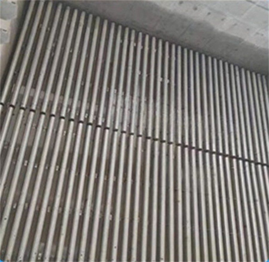 Bread pipes installed in rows on a filter floor