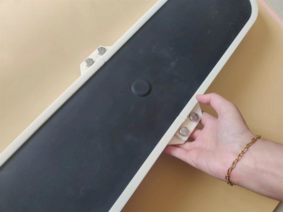 Plate aerator held in hand, membrane side up