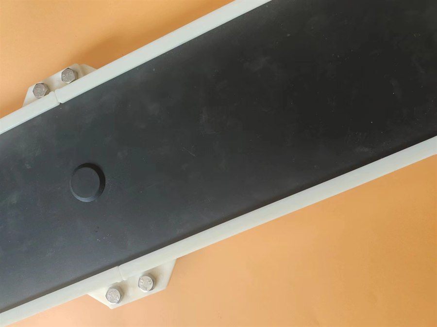Close-up of the black micro-pore membrane and the centre of the plate