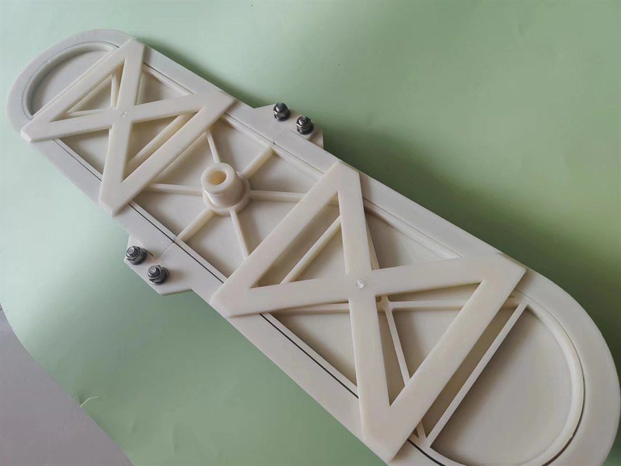 Rear view of the plate aerator with the ribbed support plate and air inlet hub
