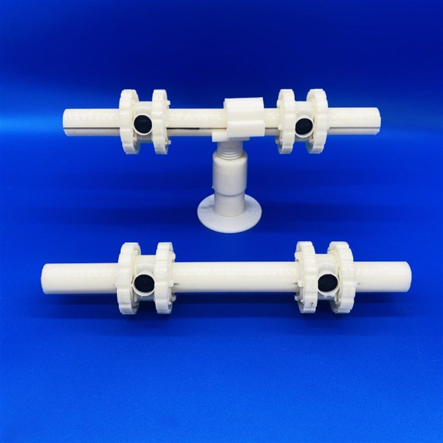 Two aerator bodies on a blue background, the upper one fitted with a centre support foot and base plate