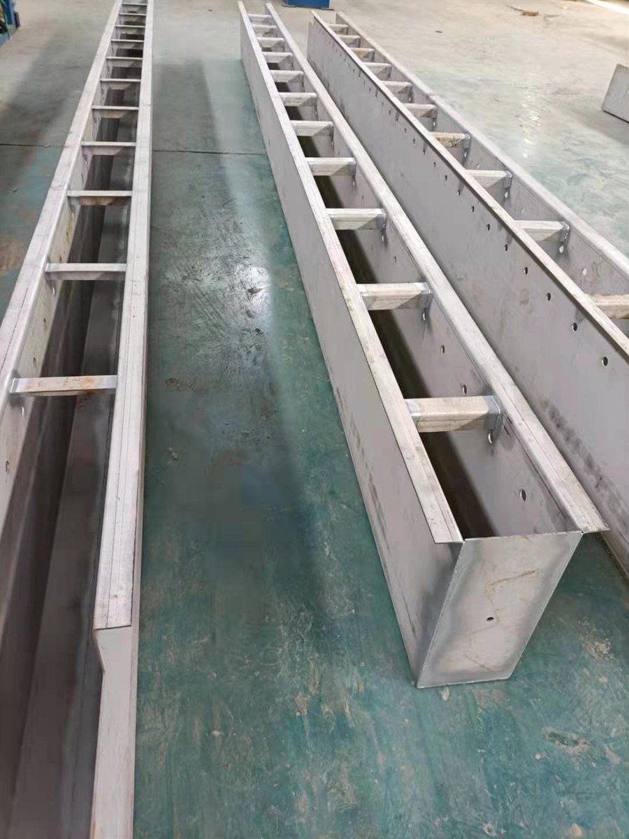 Finished stainless steel collection troughs on the workshop floor
