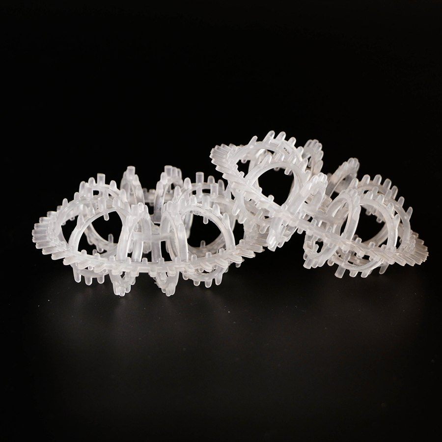 Group of semi-transparent rosette rings on a black background